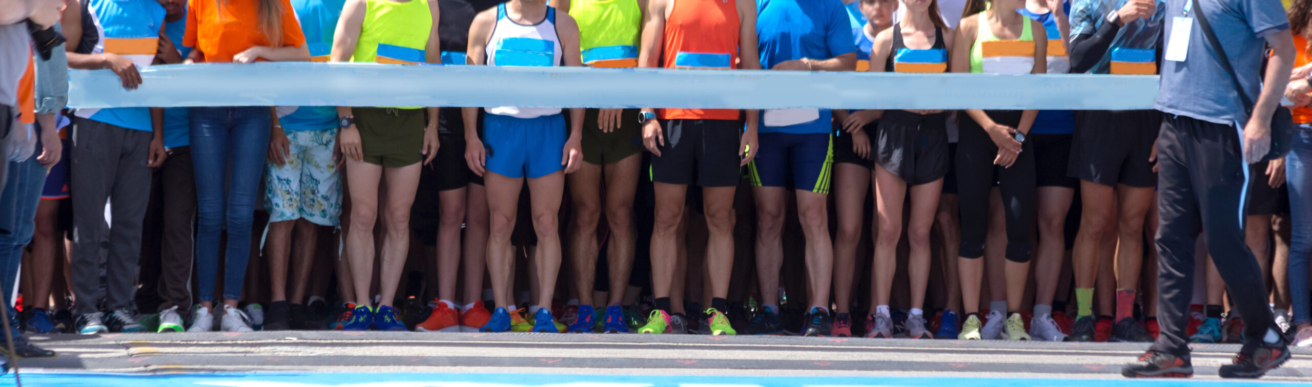 start lin in road marathon competition feet background